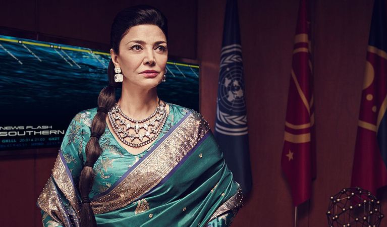 Shohreh Aghdashloo as Chrisjen Avasalara